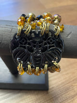 Gold & Black Beaded Bracelet with Black Emblem
