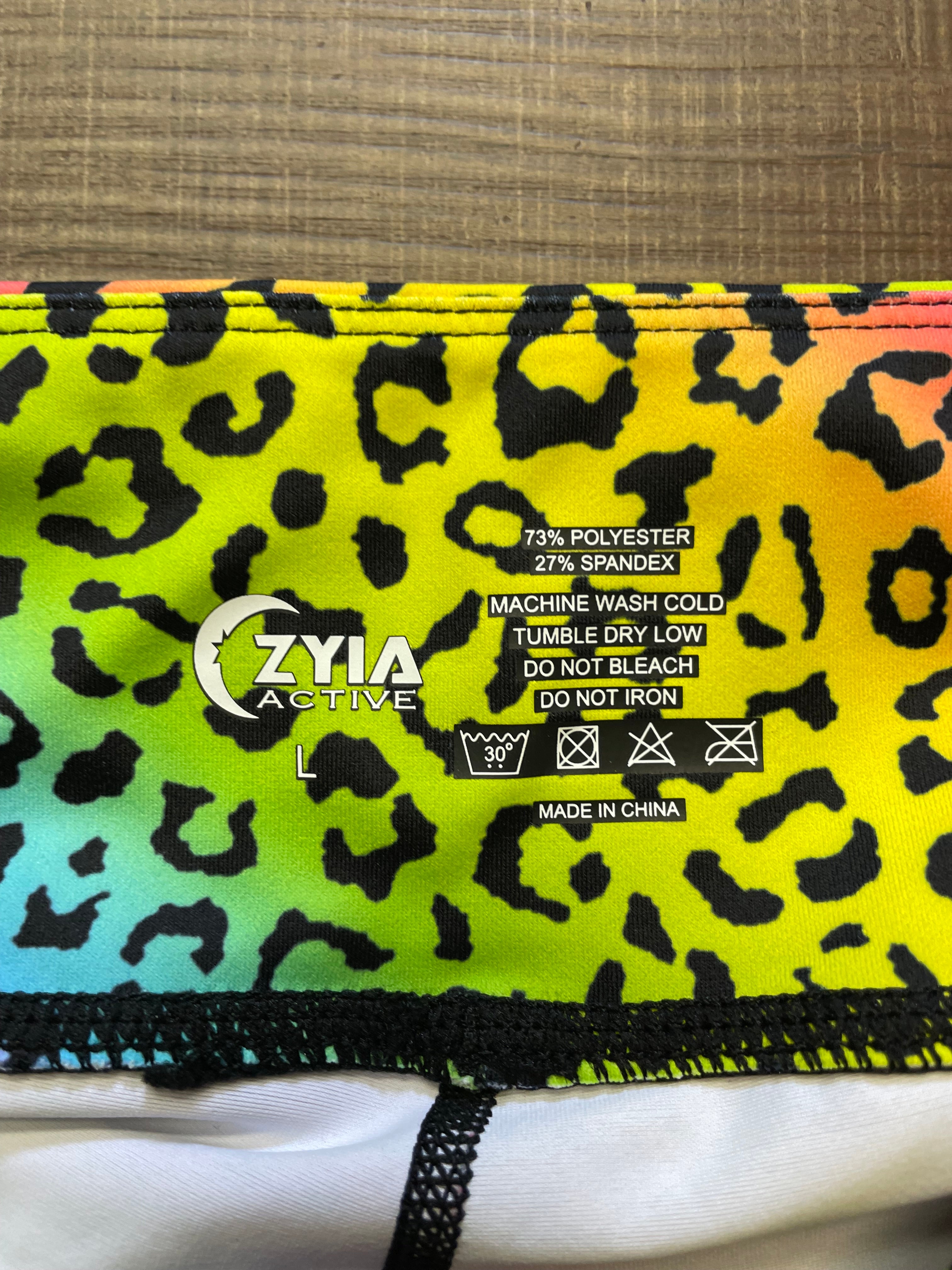 Zyia Active Rainbow Long Running Shorts (L) - BinxBerry Consignment