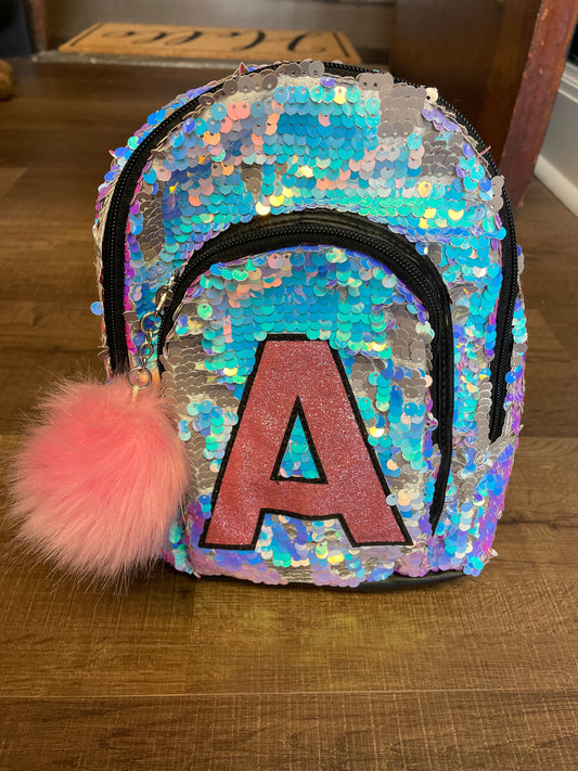 Justice Sequin Initial Backpack