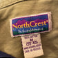 Close-up of Northcrest label on a garment with visible text and design.