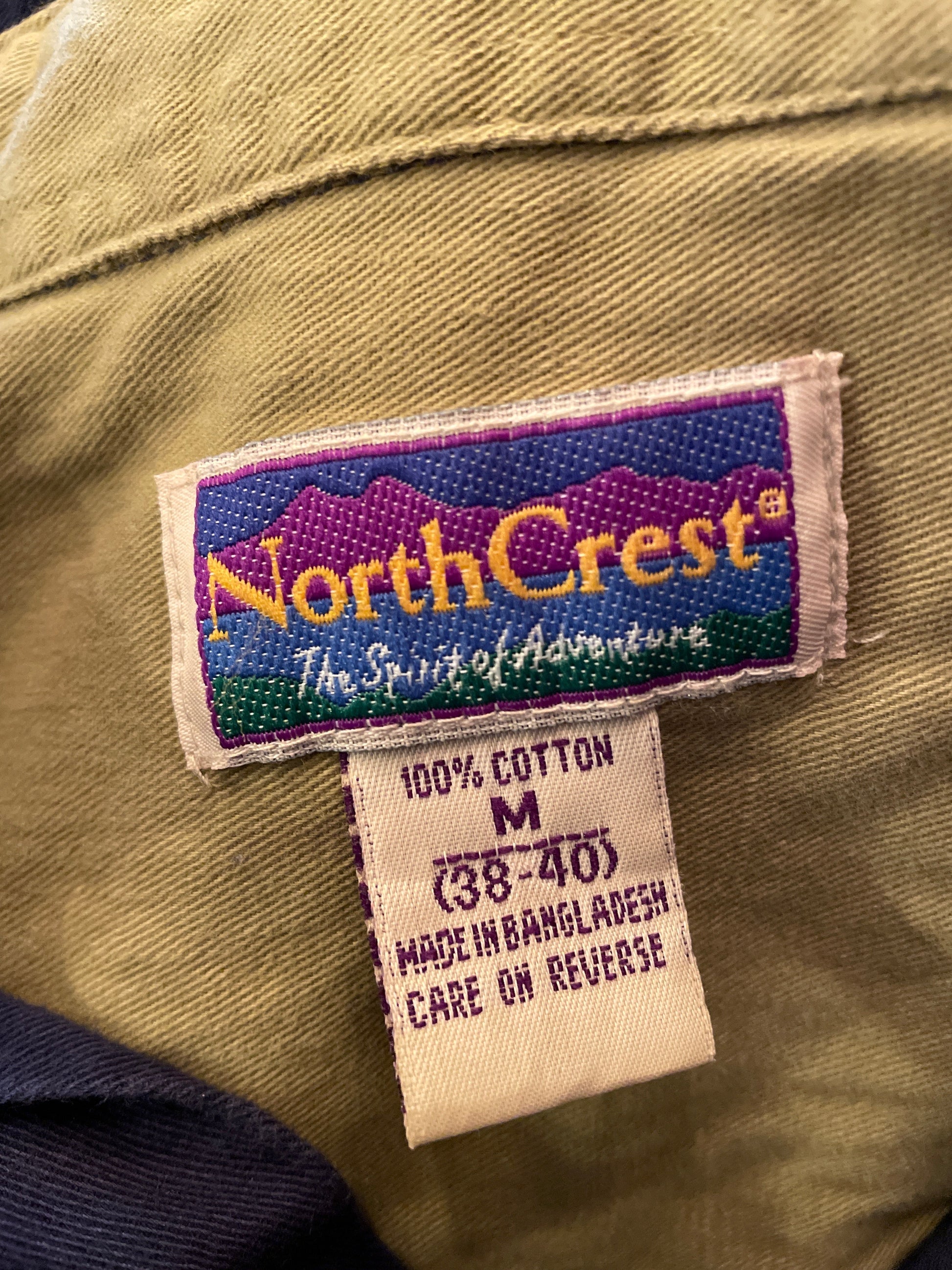 Close-up of Northcrest label on a garment with visible text and design.