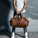 A leather bag like one that could be found at online consignment shop BinxBerry Consignment.